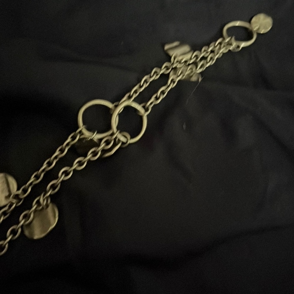 Brass necklace can be worn long or short